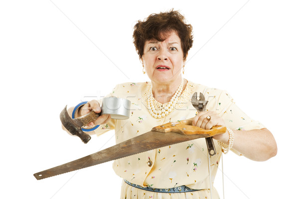 Túlterhelt otthon idősebb hölgy tart szerszámok Stock fotó © lisafx