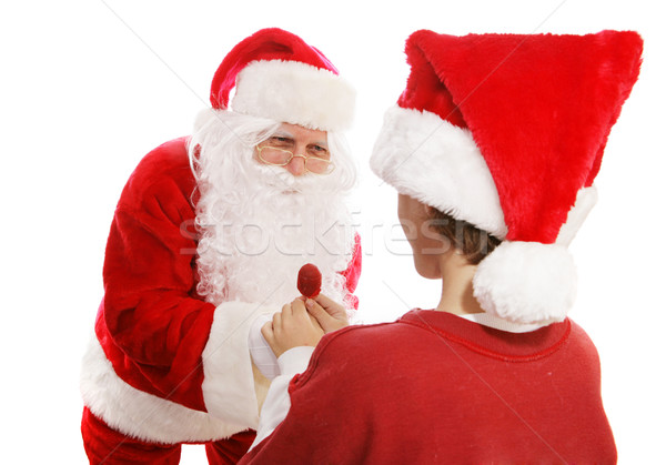 Santa Gives Lollipop to Boy Stock photo © lisafx