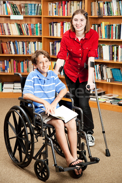 Stockfoto: Gehandicapten · kinderen · school · meisje · jongen · bibliotheek