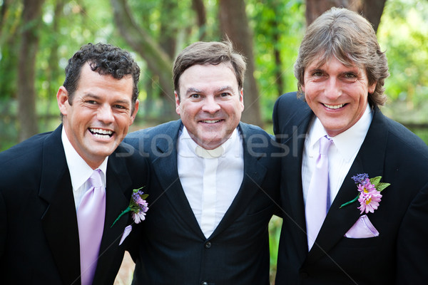 Minister Posing With Gay Wedding Couple Stock photo © lisafx