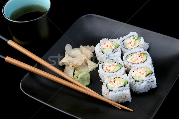 Stock photo: Sushi With Tea on Black