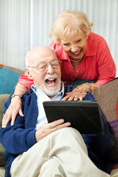 Senior Couple with Tablet PC - Laughing Stock photo © lisafx