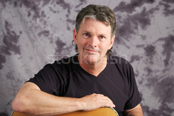Portret volwassen muzikant knap poseren Stockfoto © lisafx