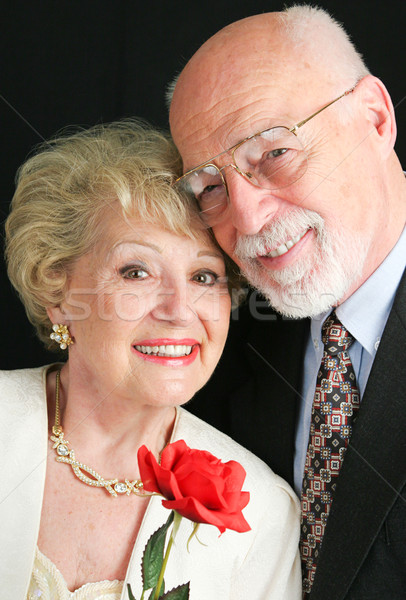 Elegant Senior Couple with Rose Stock photo © lisafx