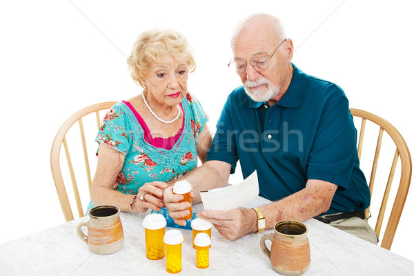 Leitura instruções farmácia casal de idosos Foto stock © lisafx