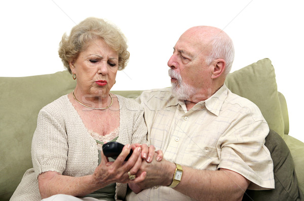 Seniors Fighting Over TV Remote Stock photo © lisafx