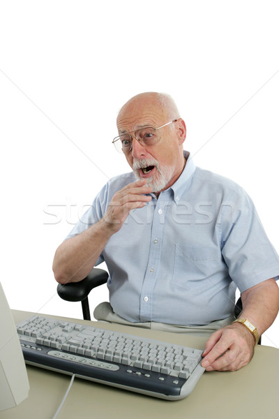 Senior homem on-line algo computador Foto stock © lisafx