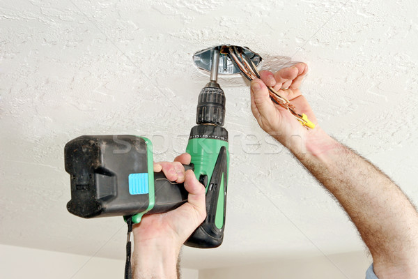 Electrician With Drill Stock photo © lisafx
