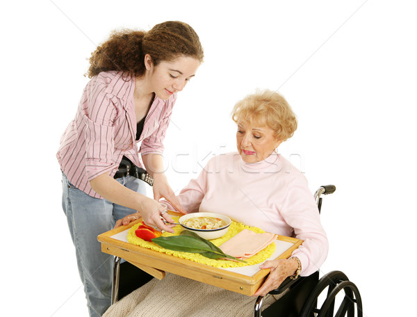 Teen Volunteer with Senior Stock photo © lisafx