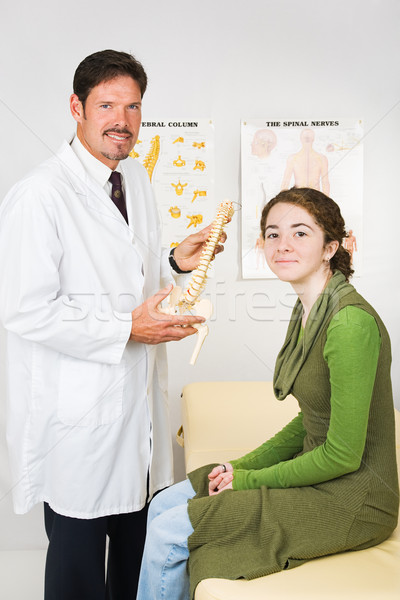 Boldog csontkovács beteg mosolyog iroda látogatás Stock fotó © lisafx