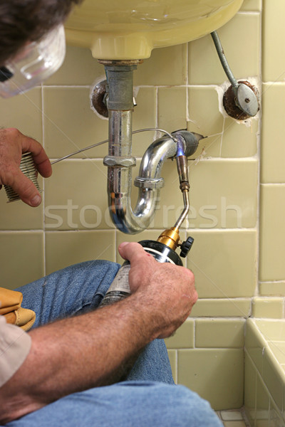 Stock photo: Plumber Using Welding Torch