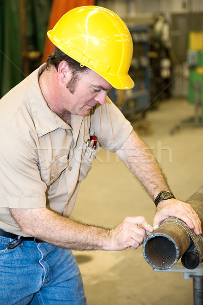 Construction Worker Marking Pipe Stock photo © lisafx