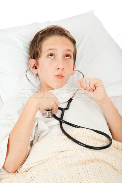 Sick Child Listening to Heart Stock photo © lisafx