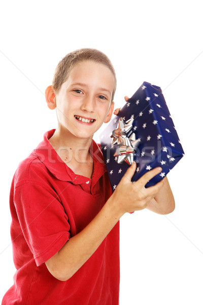Little Boy Shaking Holiday Gift Stock photo © lisafx