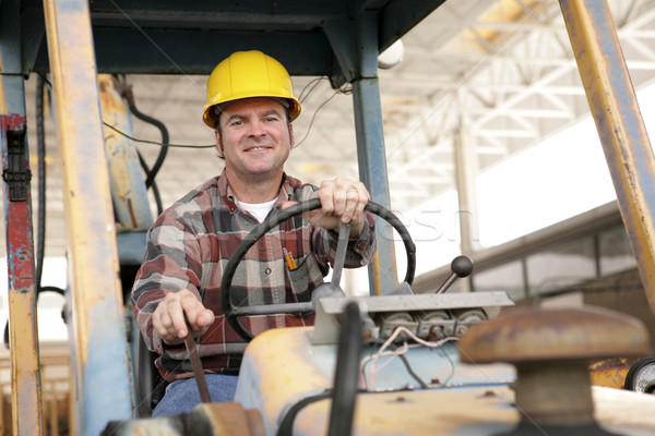 Emploi élégant travailleur de la construction conduite bulldozer [[stock_photo]] © lisafx