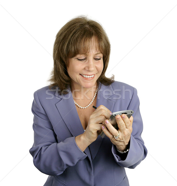 Businesswoman Enjoys PDA Stock photo © lisafx