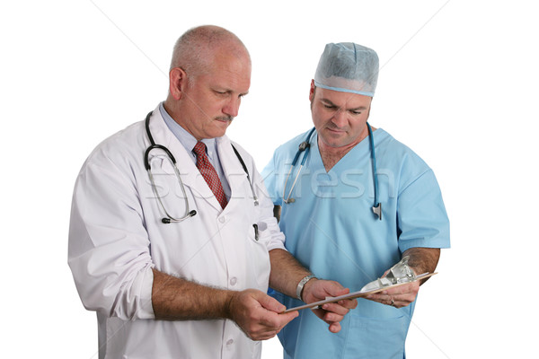 Doctors Review a Chart Stock photo © lisafx