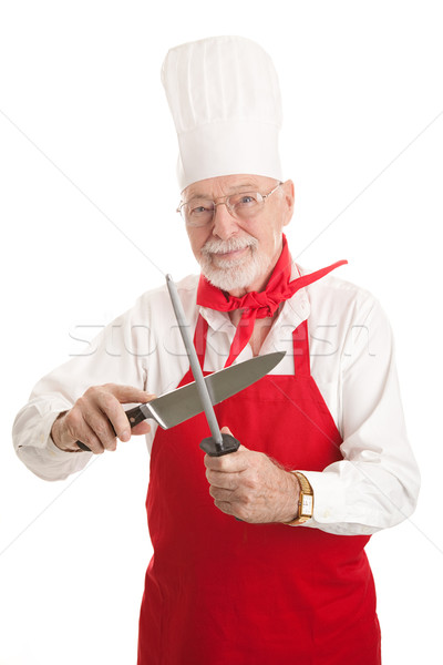 Mature Chef Sharpens Knife Stock photo © lisafx