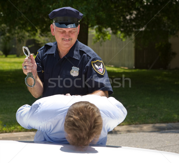 Stock photo: Police Officer with Handcuffs
