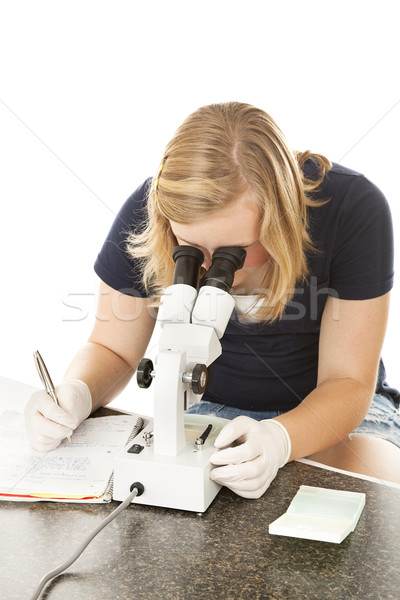 Teen Girl Using Microscope Stock photo © lisafx
