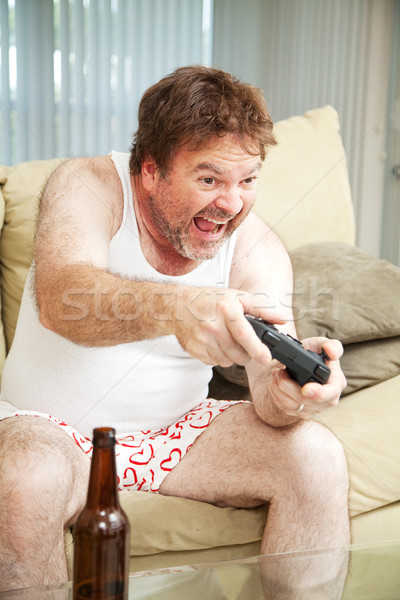 Video Gamer on Couch Stock photo © lisafx
