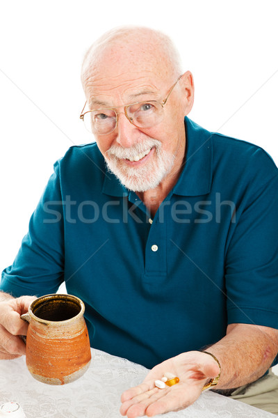 Idős férfi kiegészítők elvesz vitaminok gyógyszer Stock fotó © lisafx