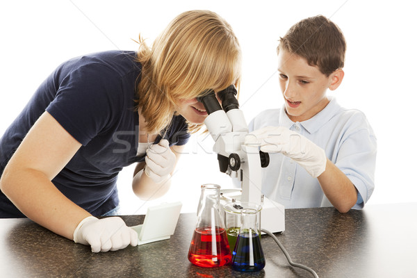 Science Kids Look in Microscope Stock photo © lisafx