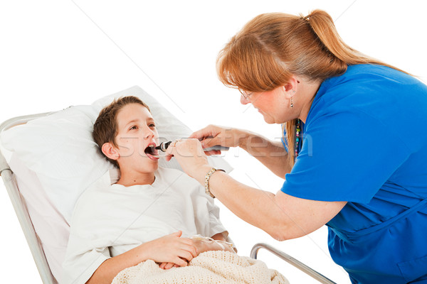 Nurse Examining Little Boy Stock photo © lisafx