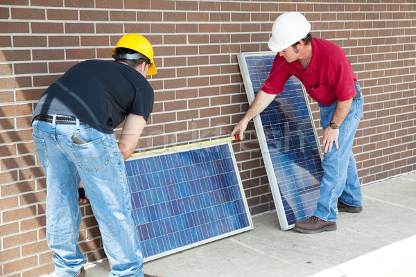 Mér fotovoltaikus napelemek installál iskola építkezés Stock fotó © lisafx