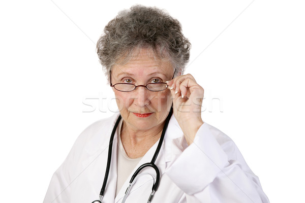 érett női orvos komoly bámul komolyan Stock fotó © lisafx