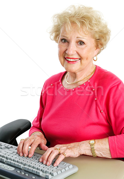 Senior senhora belo mulher datilografia Foto stock © lisafx