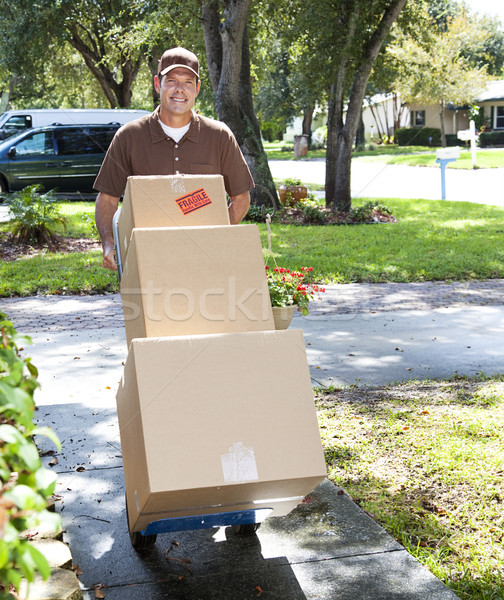 Delivery Man Coming Up the Walk Stock photo © lisafx