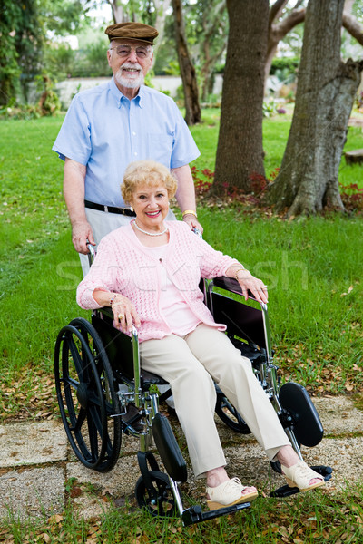 Betegség egészség odaadó idős férj toló Stock fotó © lisafx
