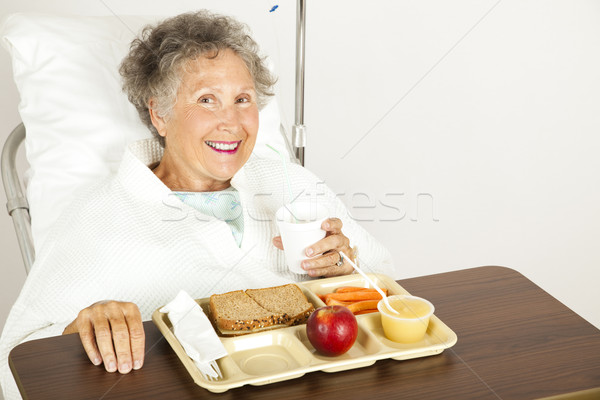 Genieten ziekenhuis voedsel senior patiënt eten Stockfoto © lisafx