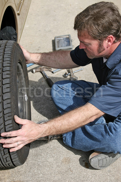 Mechanic Removing Tire Stock photo © lisafx