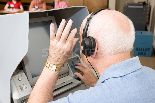 Senior Man Uses Touch Screen Stock photo © lisafx