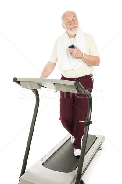 Testmozgás mp3 lejátszó idős férfi zene fut Stock fotó © lisafx
