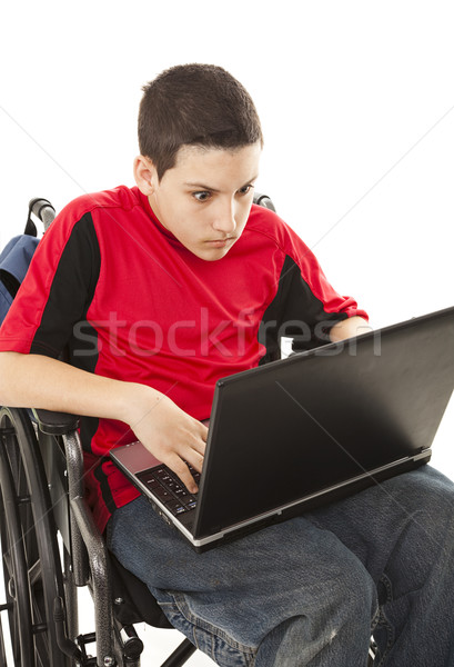 Stock photo: Disabled Teen on Laptop - Shocked
