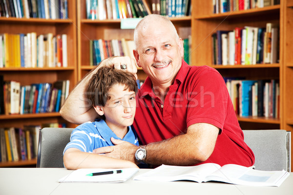 Bibliotecă enervant tata tată studiu Imagine de stoc © lisafx