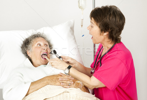 Hospital Nurse - Say Ah Stock photo © lisafx