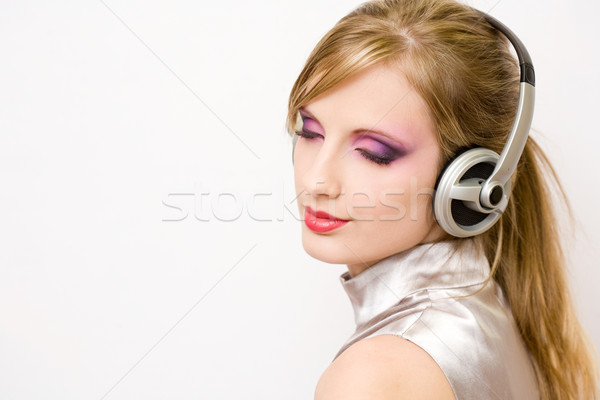 Beautiful electro pop girl in headphones. Stock photo © lithian