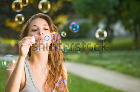 Sonhador bolha menina loiro adolescente beleza Foto stock © lithian