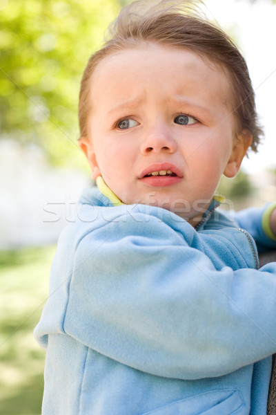Baby girl with worried expression. Stock photo © lithian