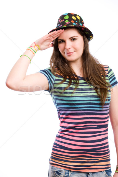Young brunette girl doing funny salute. Stock photo © lithian