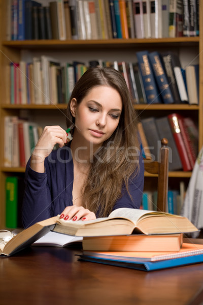 Beautiful young brunette student. Stock photo © lithian