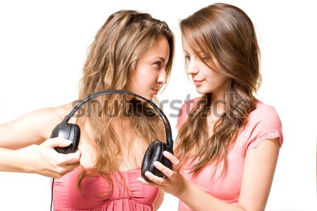 Zene kettő káprázatos barna hajú lányok zenét hallgat Stock fotó © lithian