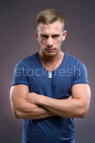 Duro tipo retrato masculino mirando joven Foto stock © lithian