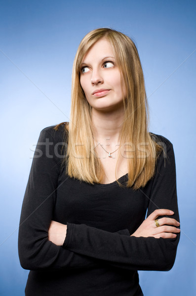 Młodych blond kobieta funny wyraz twarzy Zdjęcia stock © lithian