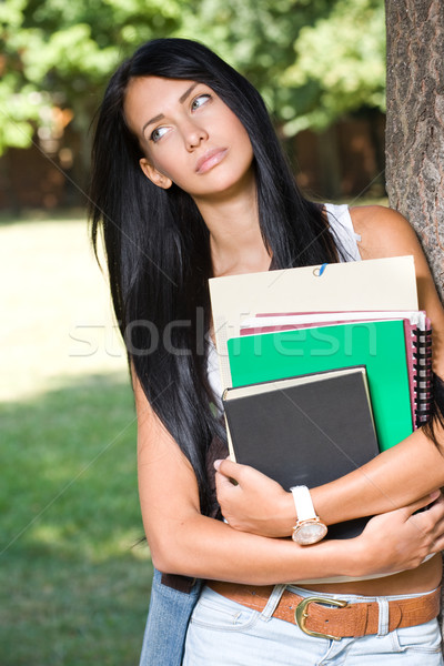 Thoughtful young student girl. Stock photo © lithian