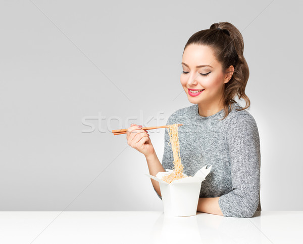 Brunette beauty with asian food. Stock photo © lithian